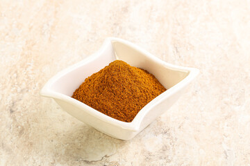 Dry Paprika powder in the bowl