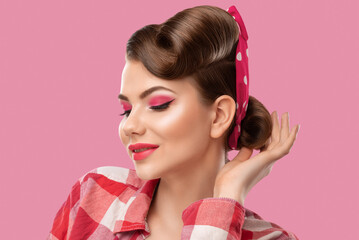 Fototapeta premium Young beautiful woman with a beautiful hairstyle and bright makeup. Professional makeup and facial care.