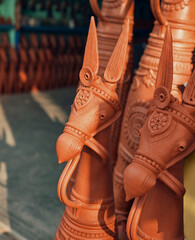 Retail display of famous terracotta made handicrafts of Bishnupur. These clay figurines, are popularly known as Bankura horse, are one of the most sought after collectible craft items in country.