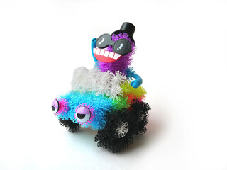 Character with eyes on the car. A figure from a children's sticky viscous ball constructor.