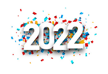 2022 white sign over colourful confetti. - obrazy, fototapety, plakaty