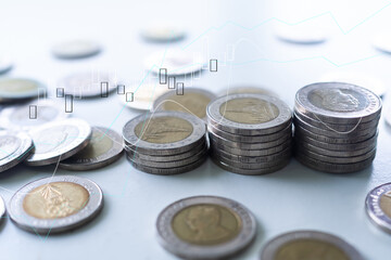Stack coin with Graph, candlestick chart stock market background. planing earn money investment and saving money future for 2022 new year. finance and business.