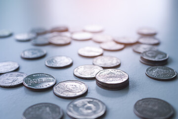 Stack Thai coin with over light day. planing earn investment and saving money future for 2022 new year. business and finance background concept.