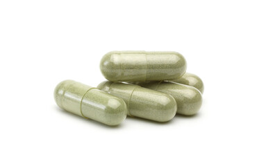 Andrographis Paniculata capsules (Herbal capsules) isolated on a white background are herbal...