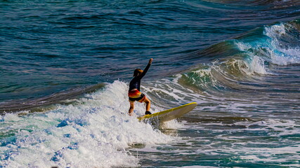 boy surfer in action