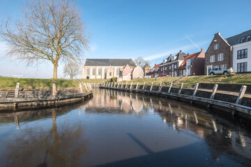 Obraz premium Grote, Boven or Sint Nicolaaskerk and the harbor of Vollenhove, Overijssel Province, The Netherlands