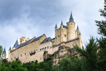 Fototapeta na wymiar The Alcazar of Segovia, a fairy castle in Castilla León, Spain. Unesco world heritage. Castilian Gothic style castle. Landscape photography