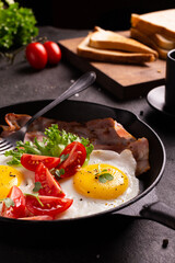 American breakfast with eggs and bacon