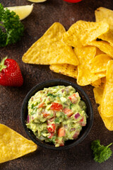 Strawberry and avocado guacamole, salsa with crispy tortilla chips