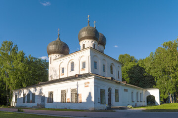 Fototapeta na wymiar Ancient Cathedral of the Nativity of the Virgin on a sunny June evening. Antoniev monastery. Veliky Novgorod, Russia