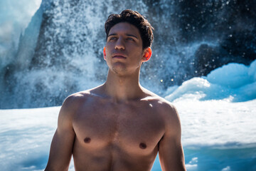 Shirtless Young Athletic Man Outdoor in Country Standing on Snow.