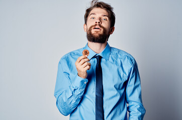 Cheerful man in a shirt with a tie finances work investment virtual money