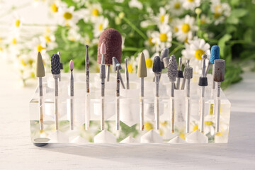 grinding and polishing attachments for cosmetic treatments such as manicure and pedicure in a...