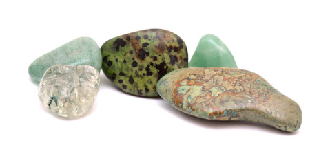 Polished semi precious stones isolated on white background 