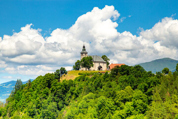 Church in French Alpes with clouds