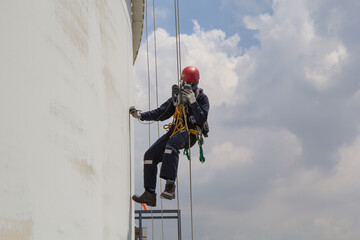 Male worker rope access  inspection