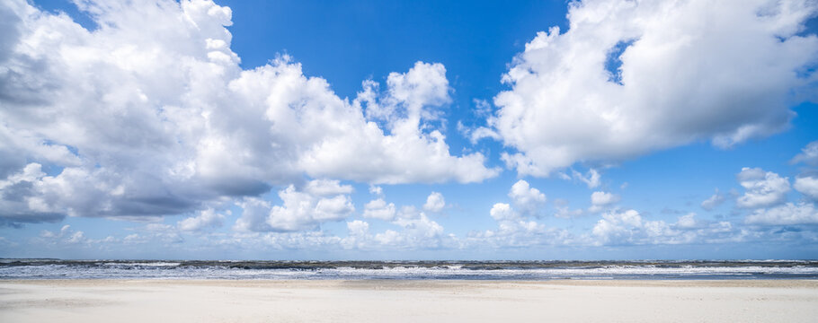 Beach panorama with blue sky and clouds