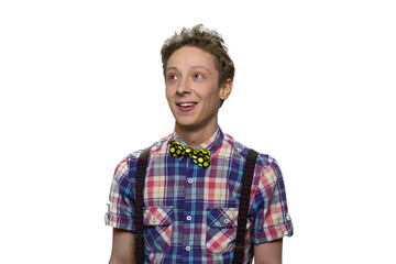 Portrait of happy teenage boy is looking up.