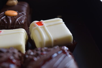 Delicious small cakes in the box