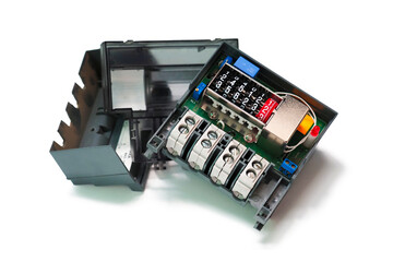 Home electrical energy consumption. Disassembled watthour meter of electricity or electric meter on...