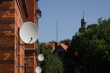 SATELLITE TELEVISION - Antennas on the facade of a classical building 