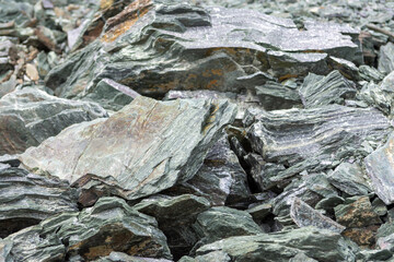huge pile with boulders near the mountain