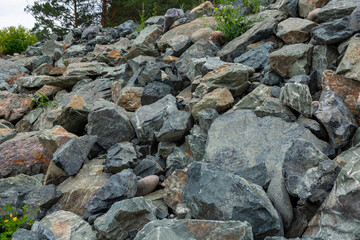 huge pile with boulders near the mountain