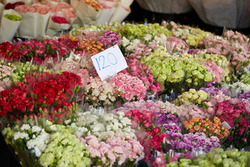 Various flowers packed in a traditional market