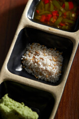Wasabi sauce, salt and soy sauce 