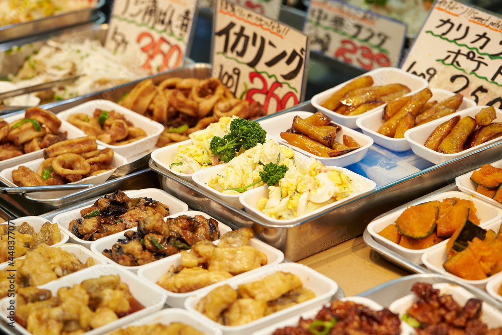 Sticker side dishes displayed in a traditional japanese market 