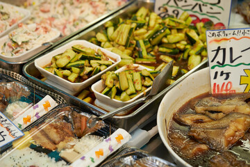 Side dishes displayed in a traditional Japanese market 