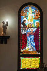 Catholic stained glass window in church, Camaguey, Cuba