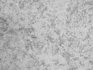 Black and white background, rough texture, looks like a cement floor for background or advertising text.