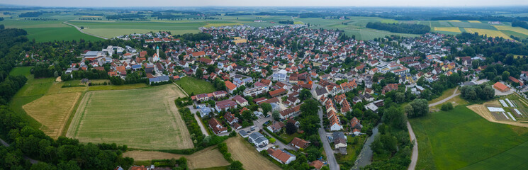 Aerial view around the city Haimhausen in Germany., Bavaria on a cloudy afternoon in spring.