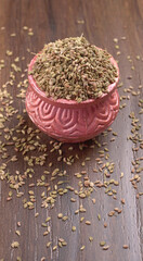Ajwain Also Know as Ajowan, Caraway or (Trachyspermum Ammi) in spoon and in bowl.