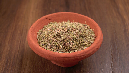 Ajwain Also Know as Ajowan, Caraway or (Trachyspermum Ammi) in spoon and in bowl.