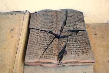 stone book broken into many pieces by a hurricane