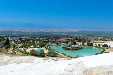 Fototapeta premium Pamukkale, Turkey - one of the most famous attractions of Turkey, Pamukkale is a Unesco World Heritage site. Here in particular the white travertine terraces