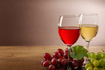 Wine composition with wine glasses and grape. Still life of glasses of red and white wine and variety of grape.
