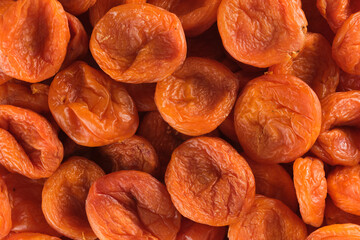 Background of dried apricots placer bright snacks; dried fruits