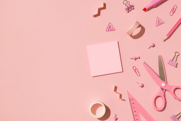 Top view photo of school accessories pink stationery adhesive tapes pushpins binder clips scissors...