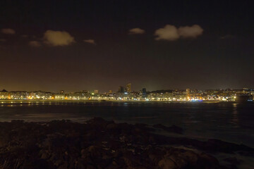 Night view of the bay of LaCoruña in front of the sea 