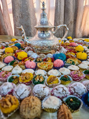 Sweet colourful cakes served at henna