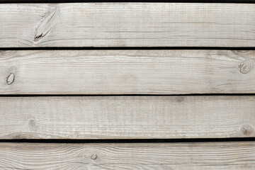 textured background from wood planks of ivory color. place for your design