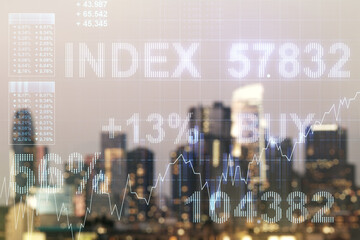 Abstract virtual financial graph hologram on blurry skyscrapers background, financial and trading concept. Multiexposure