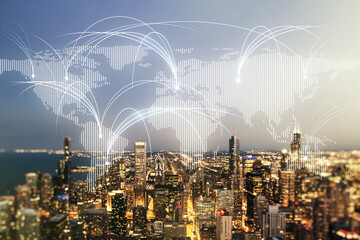 Double exposure of abstract digital world map hologram with connections on Chicago city skyscrapers...