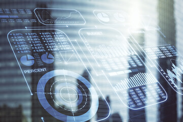 Double exposure of abstract virtual statistics data hologram on modern skyscrapers background, statistics and analytics concept