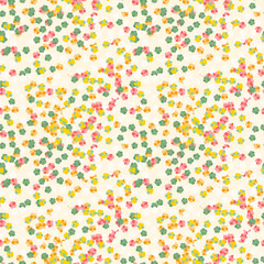Seamless pattern with tiny multicolored flowers, abstract background with cute flowers