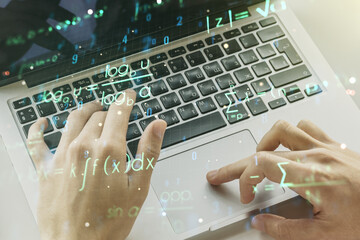 Creative scientific formula hologram with hands typing on computer keyboard on background, research...