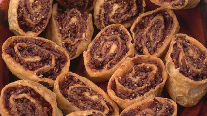 Indian traditional Snacks Bhakarvadi or Bakarvadi. Diwali snacks Bhakarwadi, selective focus.